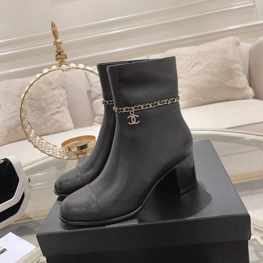 CHANEL MID-HEEL ANKLE BOOTS IN BLACK SMOOTH CALFSKIN
