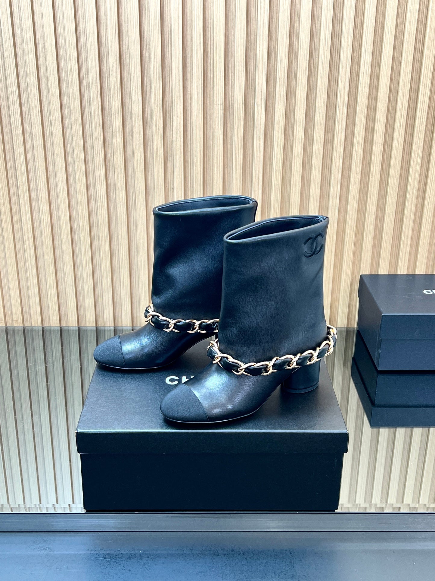 CHANEL 25S LOW BOOTS 65MM IN BLACK CALFSKIN GOLD HARDWARE