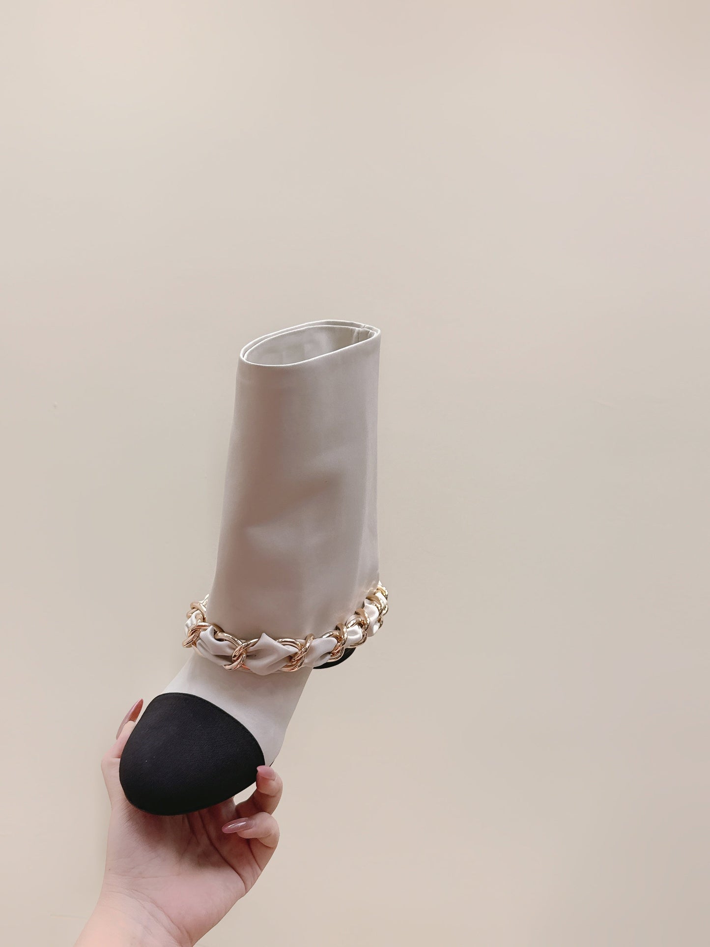 CHANEL 25S CALF-LENGTH BOOTS 45MM IN WHITE AND BLACK CALFSKIN GOLD HARDWARE