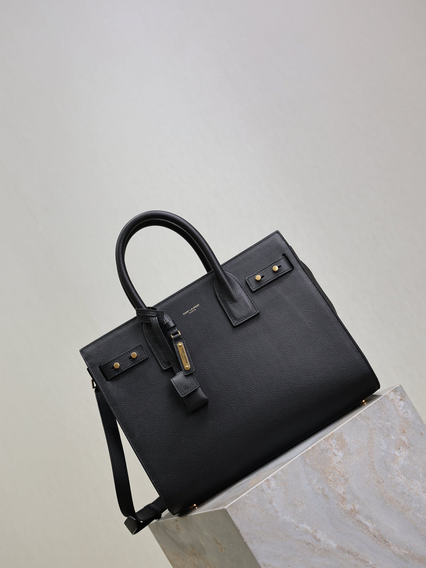 YSL 25S SAC DE JOUR GM 32 IN BLACK SUPPLE GRAINED CALFSKIN GOLD HARDWARE