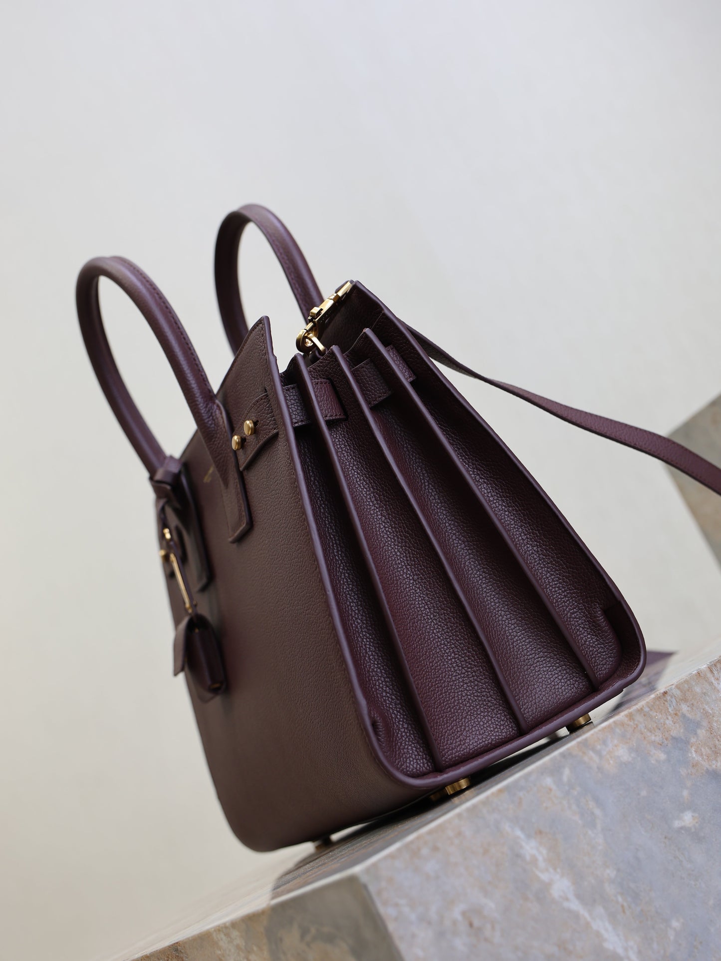 YSL 25S SAC DE JOUR GM 32 IN ROUGE CABERNET SUPPLE GRAINED CALFSKIN