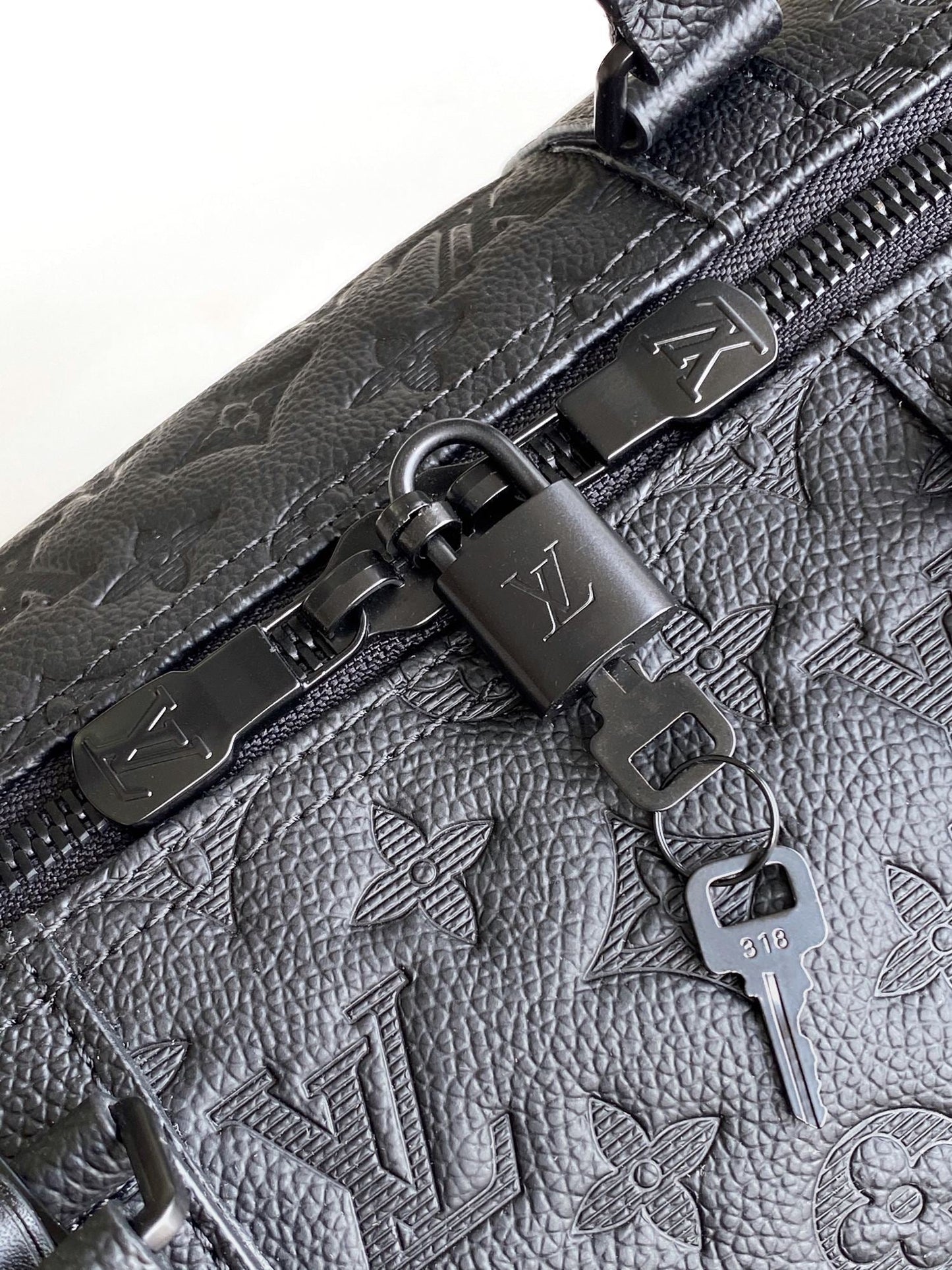 LOUIS VUITTON LV 25S KEEPALL BANDOULIÈRE BAG 50 IN BLACK EMBOSSED TAURILLON CALFSKIN MONOGRAM