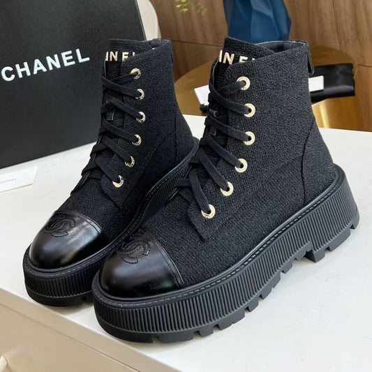 CHANEL SHORT BOOTS IN BLACK TWEED AND CALFSKIN