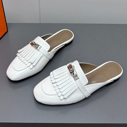 HERMES 0Z MULE IN WHITE LAMBSKIN WITH FRINGE DETAIL