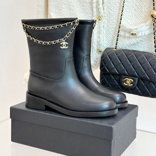CHANEL SHORT BOOTS IN BLACK CALFSKIN